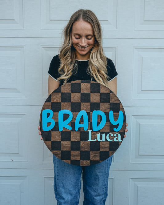 Customized Checkered Round Baby Nursery Name Sign